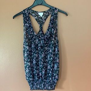 Dynamite ladies blouse in racerback style with ruffles at the front.  size S